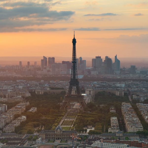Paris rooftop Paris city rooftop view with Eiffel Tower at sunset.